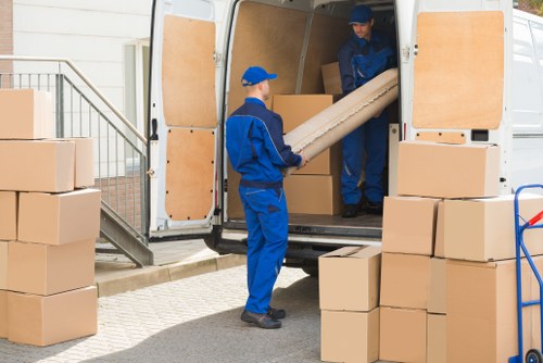 Man and van loading household items in Redbridge