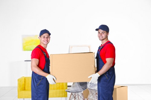 Packed boxes and household items arranged for transport