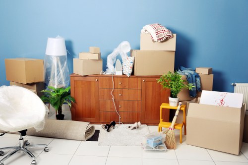 Packed boxes and protected furniture prepared for transport