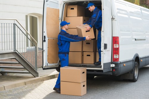 Commercial moving equipment and office boxes ready for relocation in Redbridge
