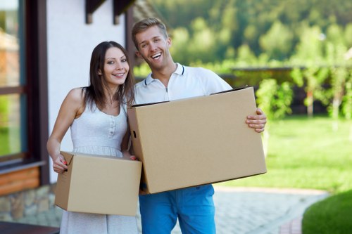 House movers loading household furniture in Redbridge