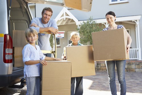 Loading furniture into a van for a Redbridge house or flat move