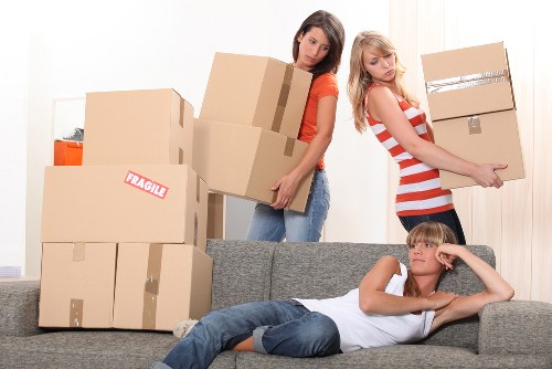 Unpacking boxes in a new Redbridge home